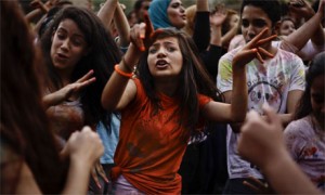 Egyptian girls dance at a festival